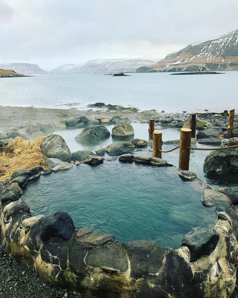 Hvammsvik natural hot springs pools on the black sand coast one of the most scenic geothermal lagoons near Reykjavik