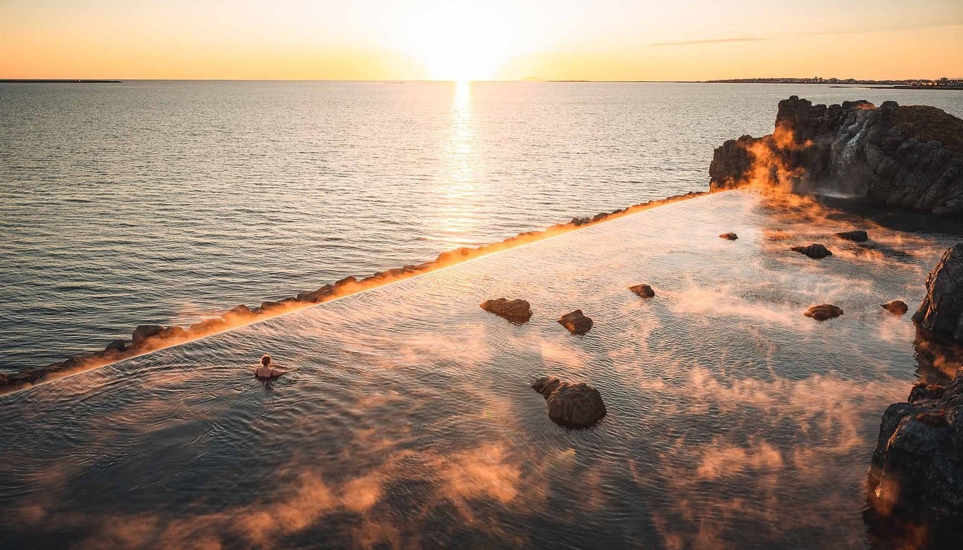 Sky Lagoon infinity pool overlooking the Atlantic ocean one of the most popular geothermal lagoons near Reykjavik Iceland