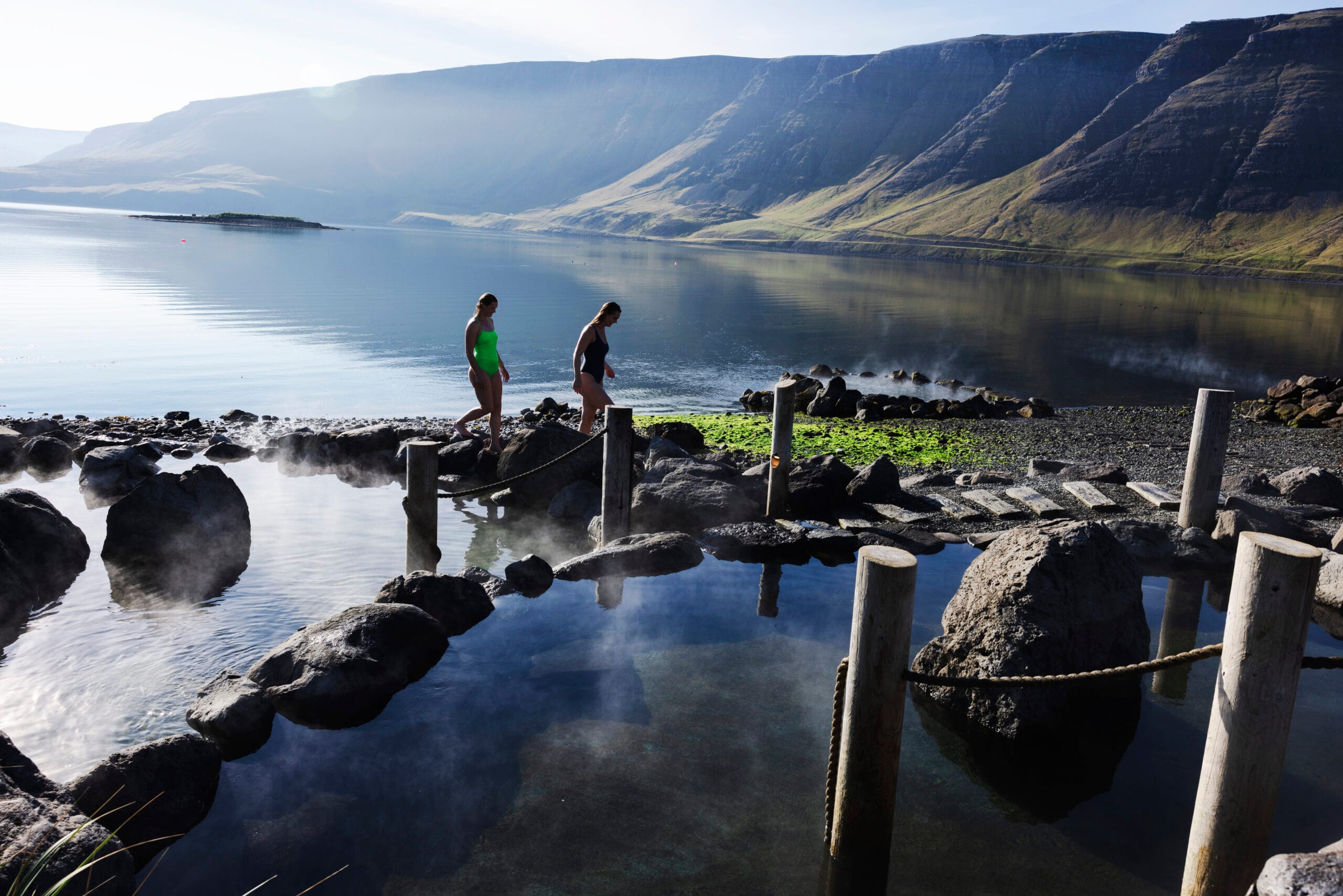 Hvammsvik natural hot springs pools on the black sand coast one of the most scenic geothermal lagoons near Reykjavik